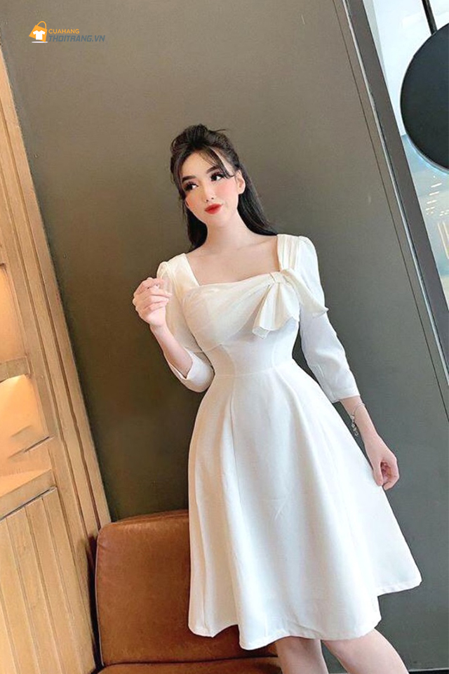 Váy màu trắng dáng xòe tay lỡ cổ nơ